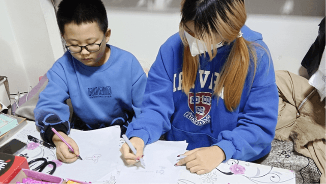 吉林长春:手拉手心连心 把爱带回家