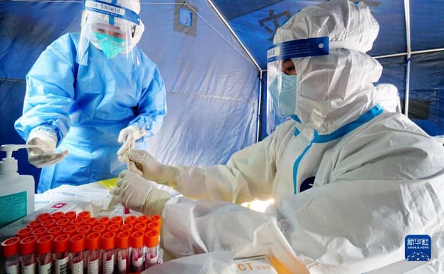 北京:抗疫一线的青年志愿者